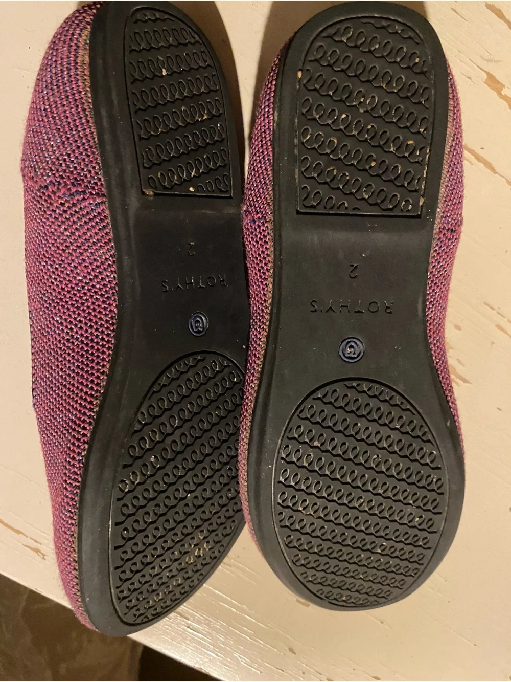 Rothy’s in Plum with Navy Trim